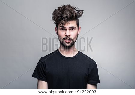 Professional studio portrait of young handsome man