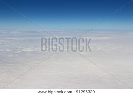 Aerial View Of Blue Sky And Cloud Top View From Airplane Window
