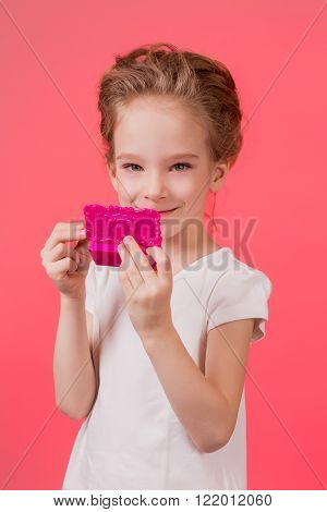 Makeup teen girl. Cute cosmetics woman having fun with make-up products.