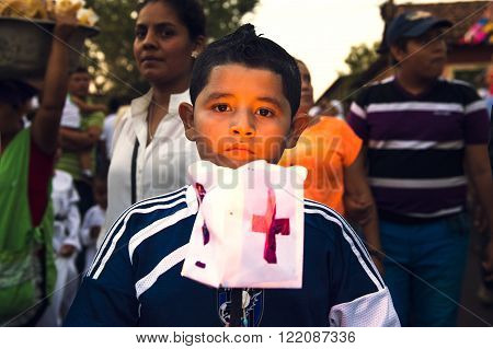 Leon Nicaragua - April 14 2014: People in a procession in the streets of the city of Leon in Nicaragua during the Easter celebrations