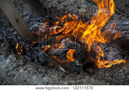 Burning Office White Paper In Bonfire