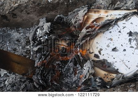 Burning Office White Paper In Bonfire