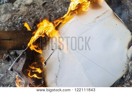 Burning Office White Paper In Bonfire