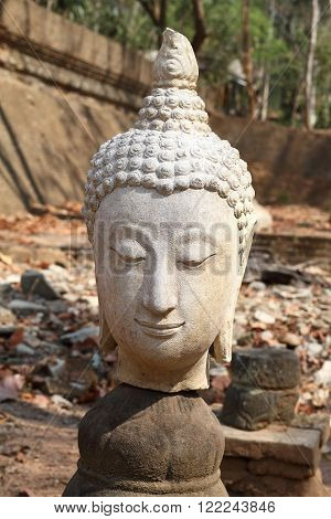 This is Buddha head broken in temple.
