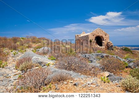 Ruined Venetian church in the fort at Imeri Gramvousa island Crete Greece Mediterranean