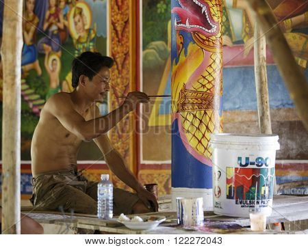 Cambodian Young Artist Paints A Temple Near Kampot.