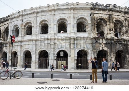 NIMES FRANCE - MAY 04 2015: Ancient Roman Theater (Arena) of Nimes. Nimes is a famous and very popular among tourists city in Provence in south of France