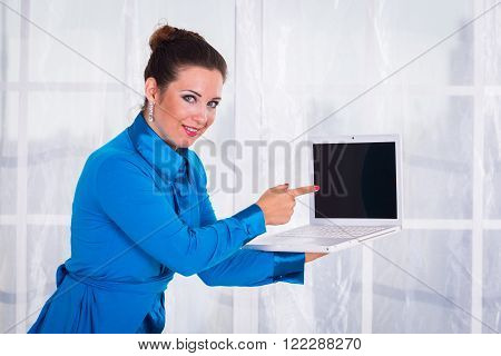 The girl in the office engaged in accounting.