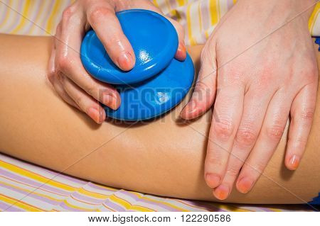vacuum massage, the girl in the spa salon.