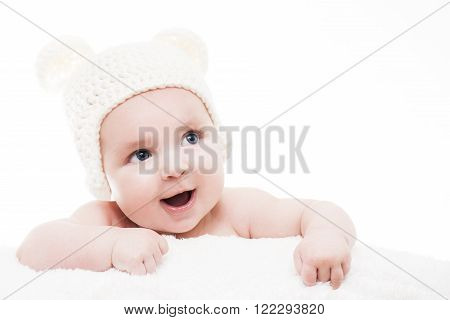 Cute baby on white background.Close up headshot of a caucasian baby boyfour months old baby looking up