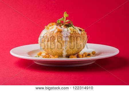 Rajasthani Shahi Raj Kachori, stuffed katchori with potato and sprout filling and served with curd, chutney and sev