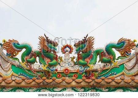 The green dragon statue in chinese temple