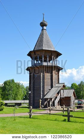 Bell tower in complex Manor Bogoslovka in the style of Russian wooden architecture in the Nevsky Forest Park in St. Petersburg.
