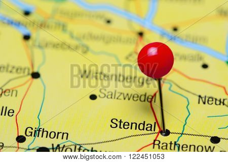 Photo of pinned Stendal on a map of Germany. May be used as illustration for traveling theme.