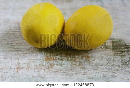 cut two lemons lie on the Board