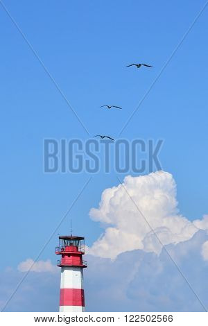 Great minimalistic summer picture of stripped lighthouse