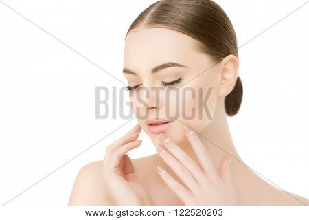 Beautiful woman face close up studio on white Beauty spa model female, clean fresh perfect skin closeup Youth care concept Portrait girl looking at camera, smiling. Cosmetology, manicure nails, hands
