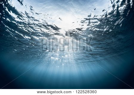 Underwater shot of the sea surface with waves in sunny day