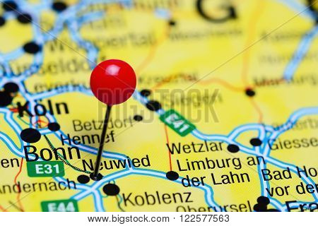 Photo of pinned Neuwied on a map of Germany. May be used as illustration for traveling theme.