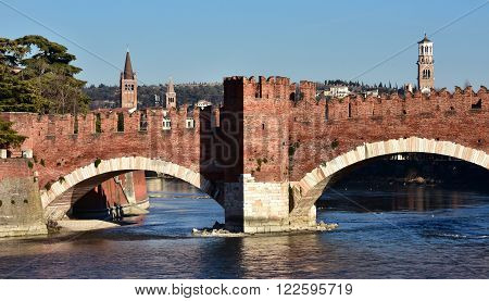 Panorama of Verona with medieval Scaliger Bridge Adige River Tower of Lamberti and belfries of St Eufemia and St Anastasia