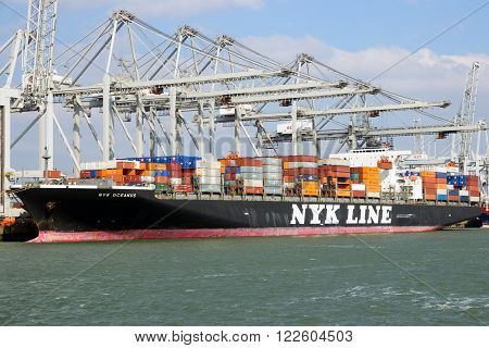 ROTTERDAM NETHERLANDS - MAR 16 2016: Container ship Nyk Oceanus from NYK Line moored at a container terminal in the Port of Rotterdam.