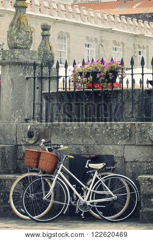 two bikes rest in a fount in Caminha, Portugal