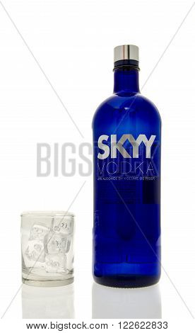 Winneconne WI - 15 March 2016: A bottle of Skyy vodka with a glass of ice