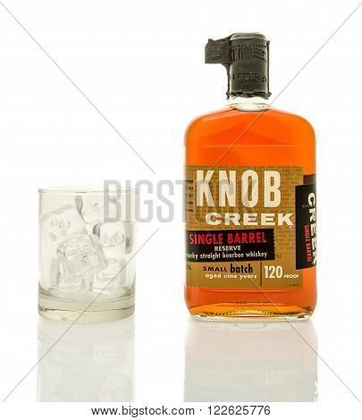 Winneconne WI - 19 March 2016: A bottle of Knob Creek single barrel whisky with a glass of ice.