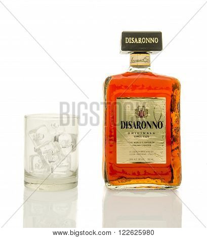 Winneconne, WI - 19 March 2016: A bottle of Disaronno liqueur with a glass of ice.