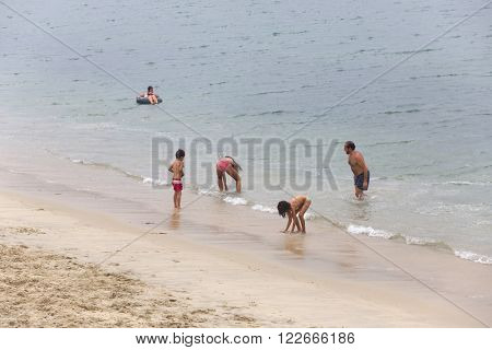 BAIONA, GALICIA, SPAIN - AUGUST 26: people at the beach, on August 26, 2015 in Baiona, Galicia, Spain