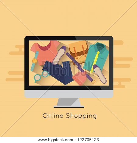 Online shopping concept with computer, clothes, backpack, shoes and accessories
