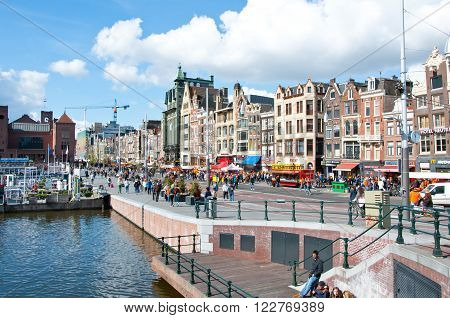 AMSTERDAM, NETHERLANDS - April 27, 2015: Rokin busy street during the King's Day on April 27, 2015 in Amsterdam. Koningsdag or King's Day is a national holiday in the Kingdom of the Netherlands celebrated on 27 April.