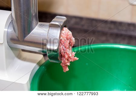 Meat grinder. In the kitchen, we get the stuffing.