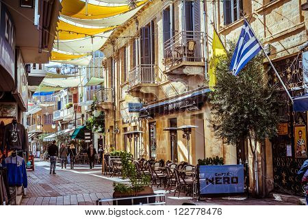 NICOSIA, CYPRUS - DECEMBER 3: People walking on Onasagorou street, popular tourist sidewalk in central Nicosia, Cyprus on December 3, 2015 in Nicosia