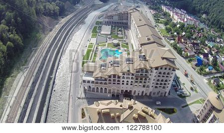 SOCHI, RUSSIA - AUG 1, 2014: Marriott Hotel located in the heart of the ski resort of Gorki Gorod in Krasnaya Polyana, aerial view