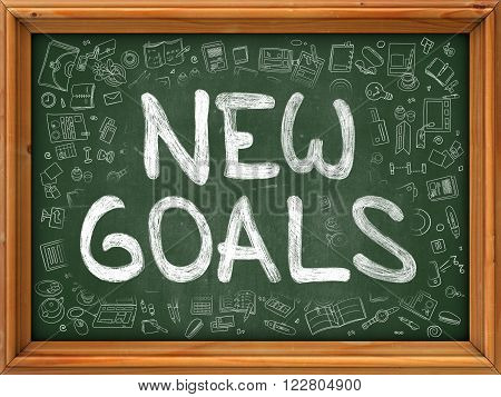 New Goals Concept. Modern Line Style Illustration. New Goals Handwritten on Green Chalkboard with Doodle Icons Around. Doodle Design Style of New Goals Concept.