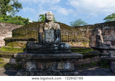 POLLONARUWA, SRI LANKA - APR 15: Ancient Buddha statue of Vatadage temple ruins in ancient city of Pollonaruwa, Sri Lanka on Dec 24, 2015 in Polonnaruwa, Sri Lanka
