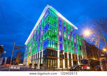 FRANKFURT GERMANY - MAR 15: Colorful illuminated office building in the city of Frankfurt Main at the Luminale 2016 festival. March 15 2016 in Frankfurt Germany
