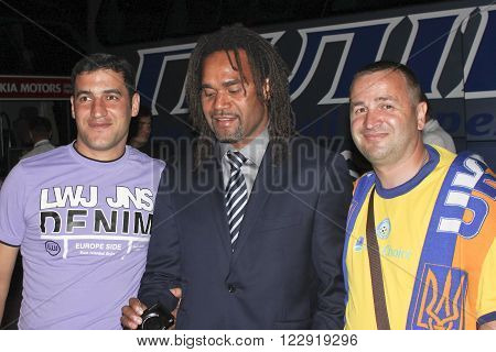DONETSK UKRAINE - JUNE 20 2012: Christian Karembeu after the match of Euro 2012 in Donetsk with fans