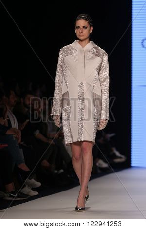 ISTANBUL, TURKEY - MARCH 18, 2016: A model showcases one of the latest creations of Ozlem Erkan in Mercedes-Benz Fashion Week Istanbul