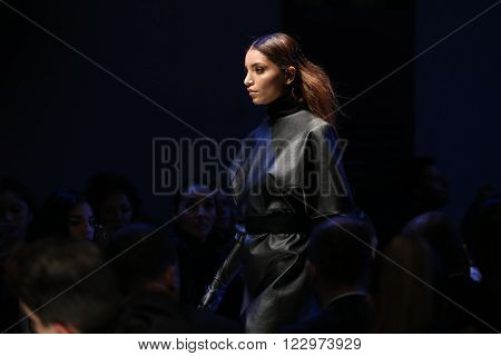 ISTANBUL TURKEY - MARCH 18 2016: A model showcases one of the latest creations of Derya Acikgoz in Mercedes-Benz Fashion Week Istanbul