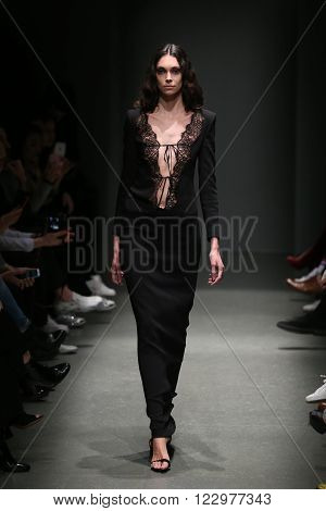 ISTANBUL TURKEY - MARCH 18 2016: A model showcases one of the latest creations of Salih Balta in Mercedes-Benz Fashion Week Istanbul