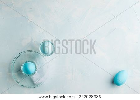 Tender white blue Easter decoration, painted Easter eggs. Copy space, Ester holiday poctcard concept.