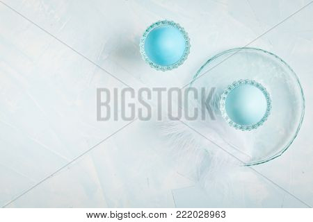 Tender white blue Easter decoration, painted Easter eggs. Copy space, Ester holiday poctcard concept.