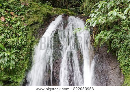 Beautiful waterfall with name Cascades aux Ecrevisses. Guadeloupe, Caribbean Islands