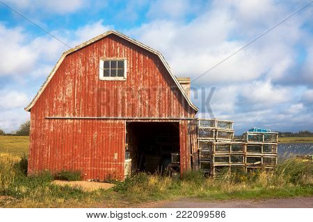 Old lobster barn on the Baltic River in summer, Prince Edward Island, Canada.