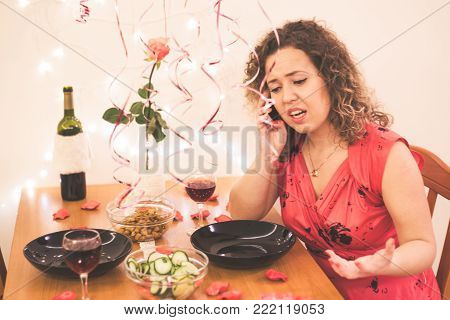 Portrait beautiful woman smile with a pink rose at restaurant on Valentines Day