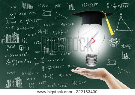 hand holding light bulb with certification for graduation shows the ingenuity intelligence knowledge and success for education on blackboard.