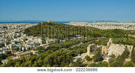Odeon of Herodes Atticus and panoramic view of Athens, Greece.
