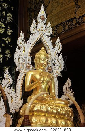 The  buddha is background status is art golden religion design in Thailand Amazing